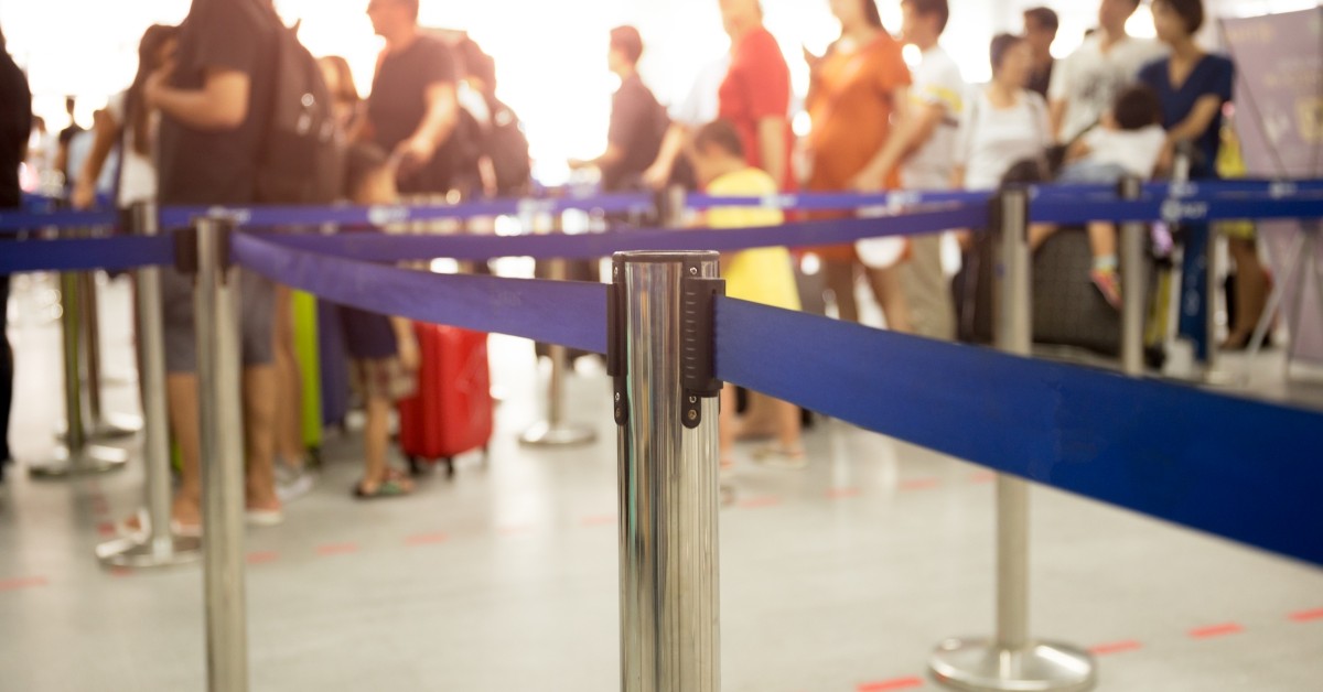 an image of a line at an airport