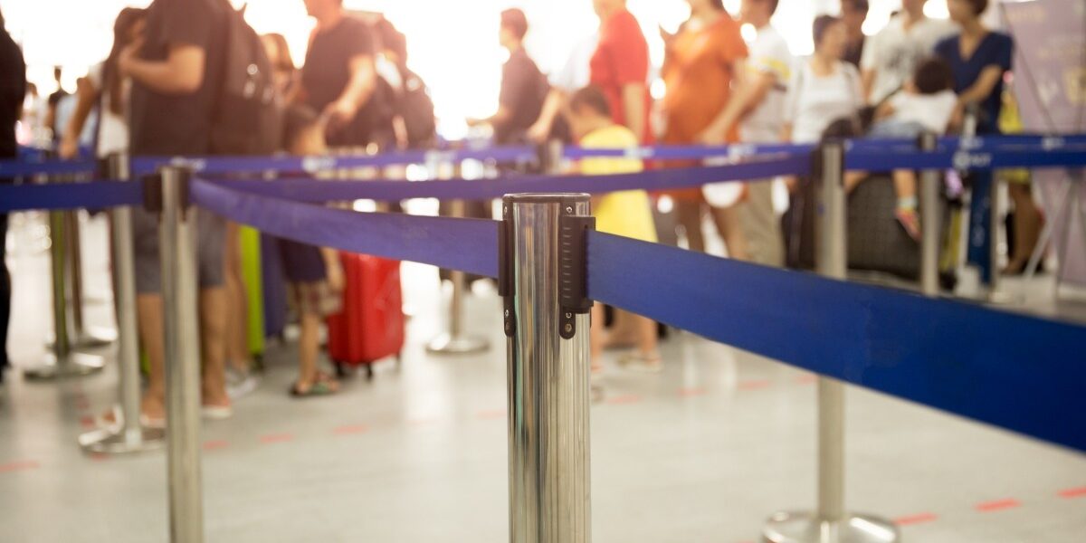 an image of a line at an airport